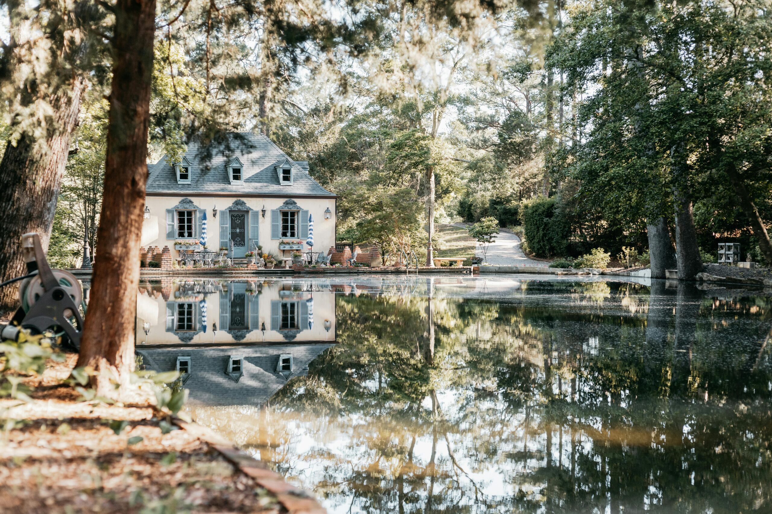 Elegant French-style cottage with reflection pool and garden in Augusta, Georgia